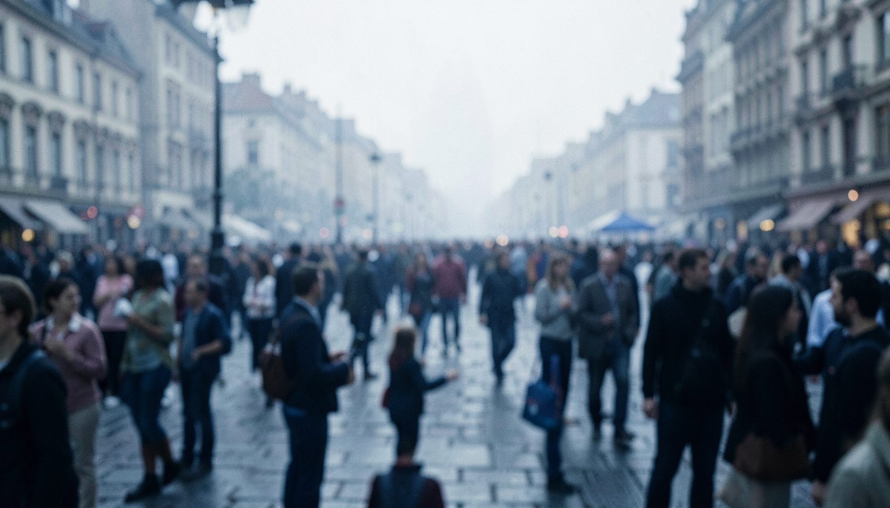 A wide city square filled with crowds, hazy atmosphere with diffuse light, muted urban tones